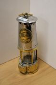 A 20th Century Eccles Type 6 miner's lamp, measuring 24cm tall