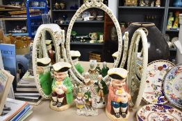 Two Capo-Di-Monte porcelain figure groups, each with printed marks to underside, two 'Toby jugs, and