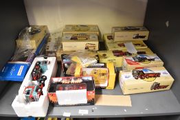 A shelf of modern diecasts, Corgi Classics x 10, Wagons and Buses, First Gear Fire Dozer x2, First