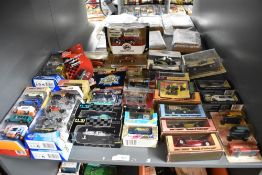 A shelf of mixed vintage die-casts including 1973 Matchbox Models of Yesteryea0, 1980's Matchbox,