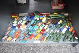 A shelf of Matchbox Lesney, Matchbox playworn die-casts including Military, Batman, Vans,