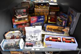 A shelf of modern die-casts including Corgi Chipperfield 97889 AEC Cage Truck and Trailer, 97887
