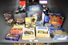 A shelf of modern die-casts including Hasbro Star Wars Episode 1 Sebulba's Podracer, , Men in