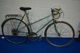 A Raleigh Atlanta bike, A vintage Raleigh Silhouette ladies racing bike and A Kielder Freespirit