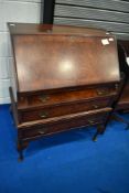 A reproduction Queen Anne style bureau
