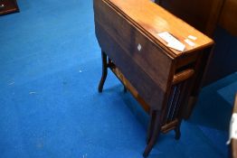 A Victorian oak Sutherland style occasional table