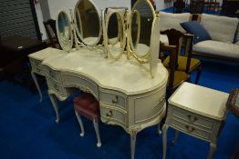 A vintage French style dressing table, stool and pair of bedside tables