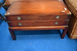 A modern campaign style coffee table with two long drawers, approx. dimensions W83, H51, D43cm