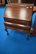 An early 20th Century bureau having ball and claw feet, width approx 78cm
