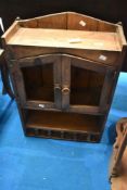 A rustic wall cabinet, approx 75 x 50 x 22cm