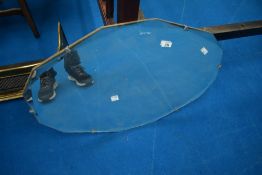 A vintage frameless wall mirror, approx. 74 x 49cm