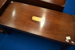 A modern campaign style coffee table, approx. dimensions W107, D46cm