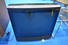 A vintage Bang and Olufsen TV, model Beovision MX6000, with remote control