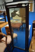 A modern mahogany cheval mirror