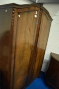 An early 20th Century walnut two piece bedroom suite