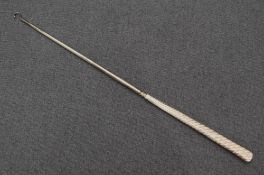 A large 19th century silver handled button hook of a twisted rope design, marks for Chester 1887
