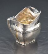A George III silver of moulded square form with generous spout, angular handles, bright-cut panels