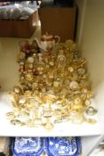 A large collection of miniature clocks and time pieces, of novelty design.