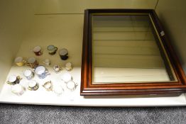 A selection of cabinet cups and miniature cups, including Coalport, Mintons, Crown Staffordshire and