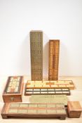 A small collection of Victorian and other inlaid cribbage boards
