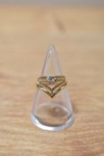 Two 9ct gold rings comprising a diamond chip solitaire in an illusion setting, having a decorative