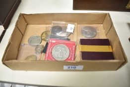 An assortment of modern crown and a 1911 florin.