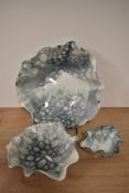 Three Deborah Brett ceramic dishes, decorated in her signature 'bubble glaze', the largest