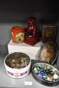 A miscellany of items, to include vintage tins, assorted keys, a tin of marbles and a dog of foo.