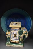 A studio pottery charger, in blue swirled colour way, by John Fraser, Corner cottage, Sewing shields