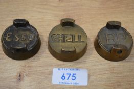 Three vintage petrol can caps Shell, Esso, and BP