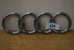 A set of Audi rings car badge