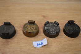 Four vintage petrol can caps BP, Esso, Shell Mex, and Shell