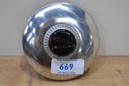 A Jaguar tax disc holder