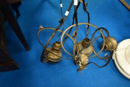 Three vintage suspended ceiling oil lamps