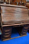 An early 20th Century oak roll top desk (af)