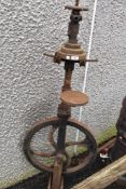 A vintage foot driven drill press