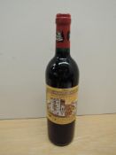 A bottle of Chateau Ducru-Beaucaillou 1995 Saint-Julien Grand Cru Classe De Medoc En 1855, Mis En