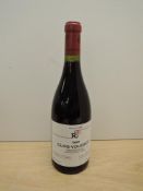 A bottle of R.E.Clos Vougeot 1999 Grand Cru, Domaine Rene Engel, Mis En Bouteilles A La Propriete,