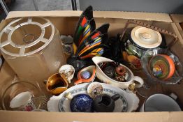 A Tifanny style lamp in the shape of a butterfly, a 1930's lusterware biscuit jar and a Hornsea