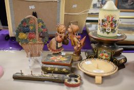 A selection of hand painted folk art and ceramics including a trinket box, two candle holders and an