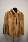 A vintage blonde mink short jacket.
