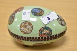 A 20th century cloisonné egg trinket box, having foliate decoration on mint green ground.