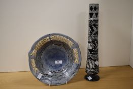 A 20th Century Chinese studio pottery bowl, having a blue glaze and reticulated fish border,