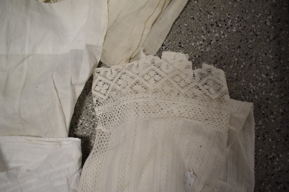 A large collection of Victorian to early 20th century petticoats and aprons, many with intricate - Image 11 of 12