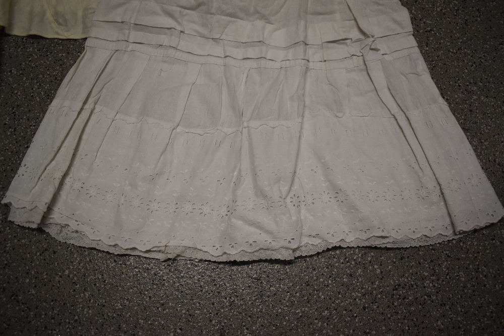 A large collection of Victorian to early 20th century petticoats and aprons, many with intricate - Image 2 of 12