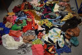 A massive collection of vintage headscarves, over 100 in total, including silk examples.