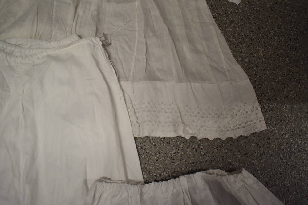 A large collection of Victorian to early 20th century petticoats and aprons, many with intricate - Image 6 of 12