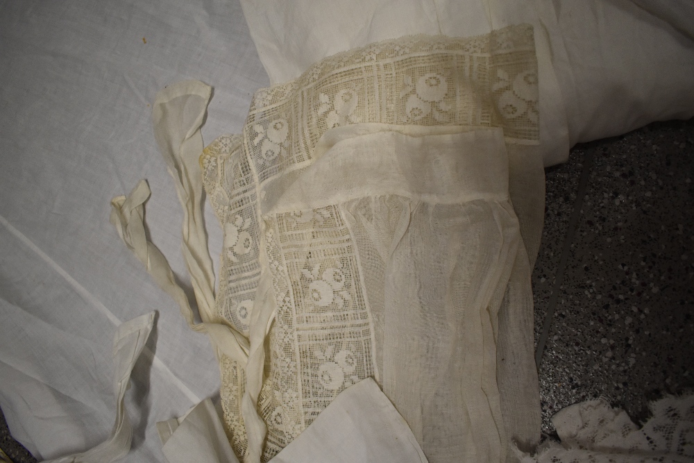 A large collection of Victorian to early 20th century petticoats and aprons, many with intricate - Image 10 of 12