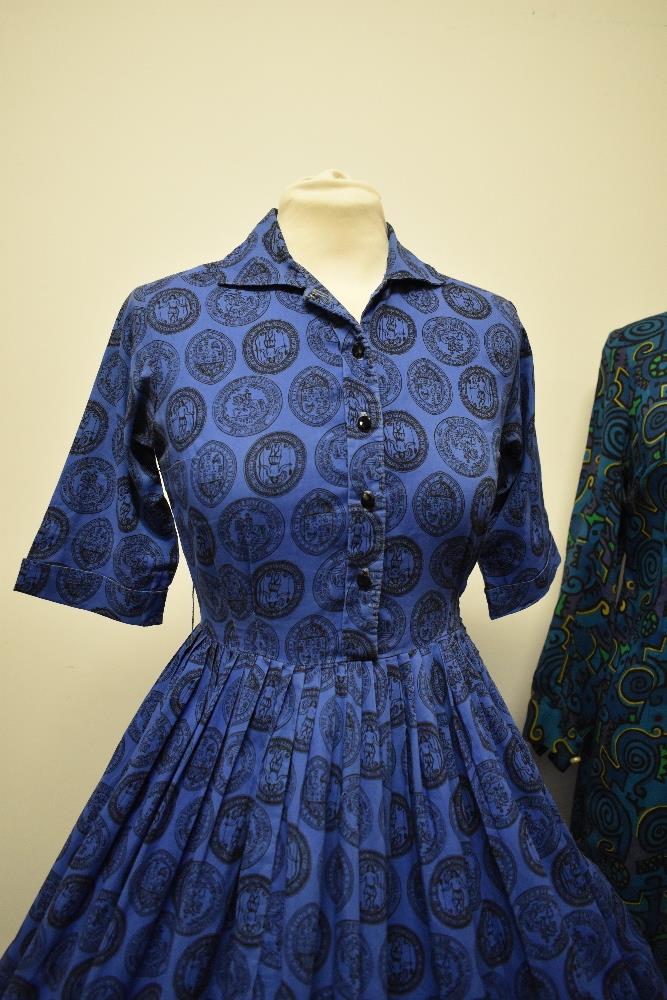 A 1950s full skirted cotton day dress, having brilliant novelty medallion print on cobalt blue - Image 2 of 9