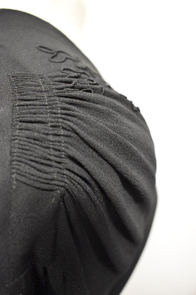 A late 1930s / 1940s black crepe day dress, having braiding to front with sequins, panelled skirt, - Image 7 of 8